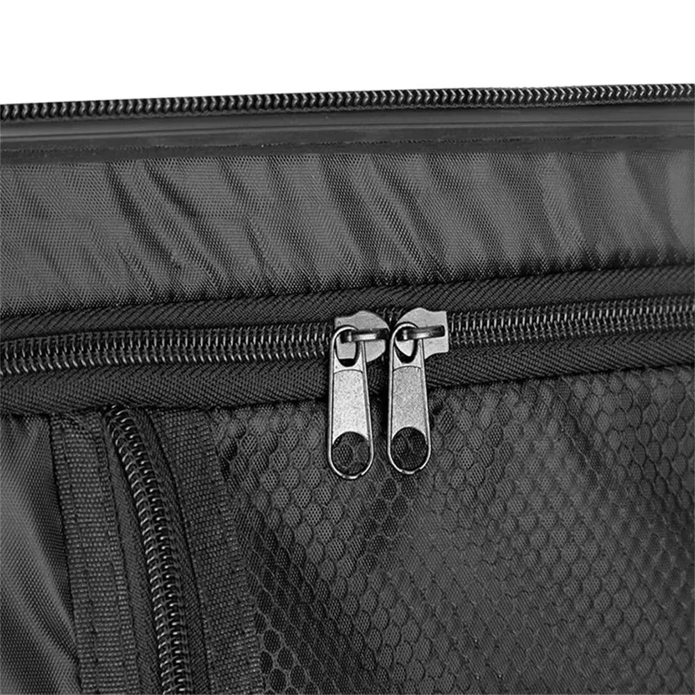 Purple hard-shell suitcase set with diagonal lines and spinner wheels