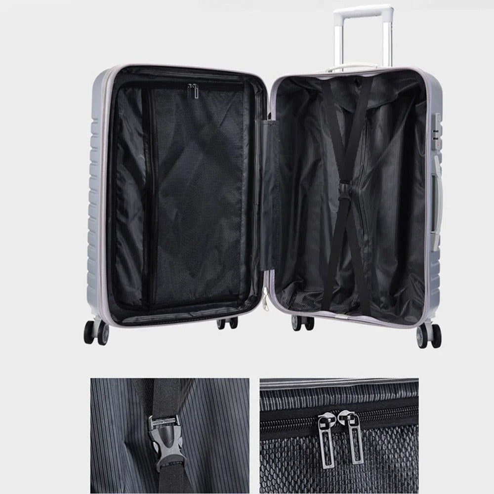 Silver hard-shell suitcase with diagonal lines and spinner wheels