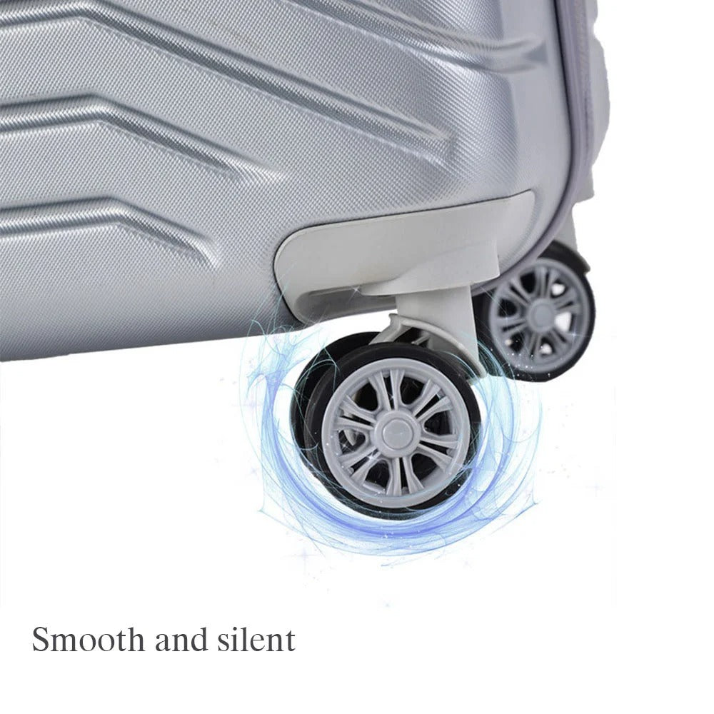 Silver hard-shell suitcase with diagonal lines and spinner wheels