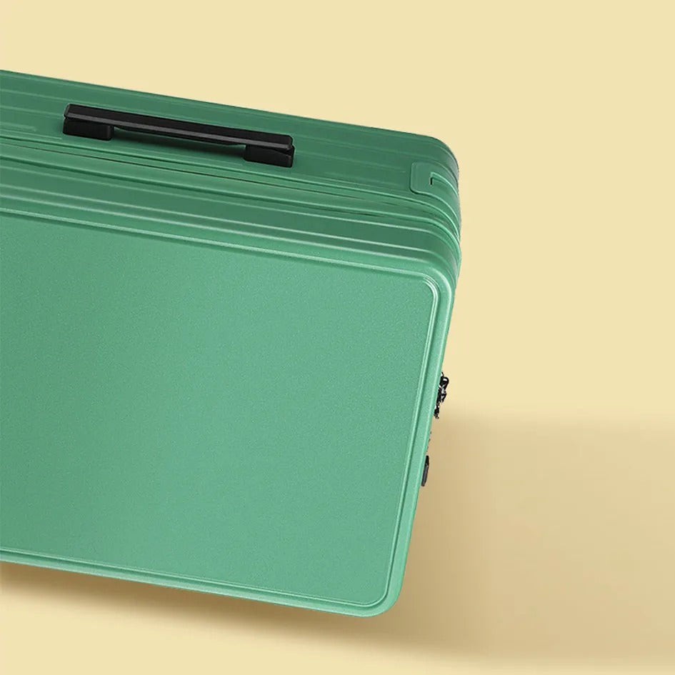 Green hard-shell suitcase with smooth panels and spinner wheels