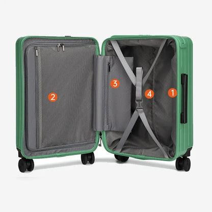 Green hard-shell suitcase with smooth panels and spinner wheels