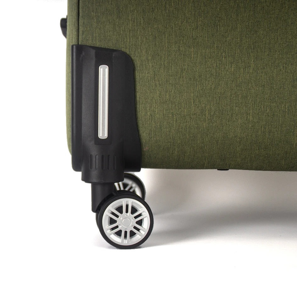 Green soft-shell suitcase with fabric exterior and spinner wheels